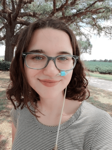 Young woman taking a selfie in the park